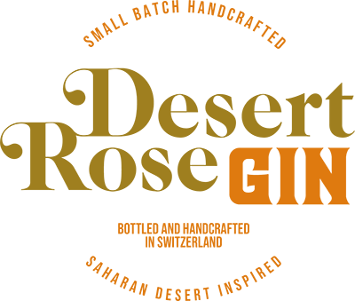 Desert Rose Gin label featuring Swiss bottling and Saharan inspiration in bold text.