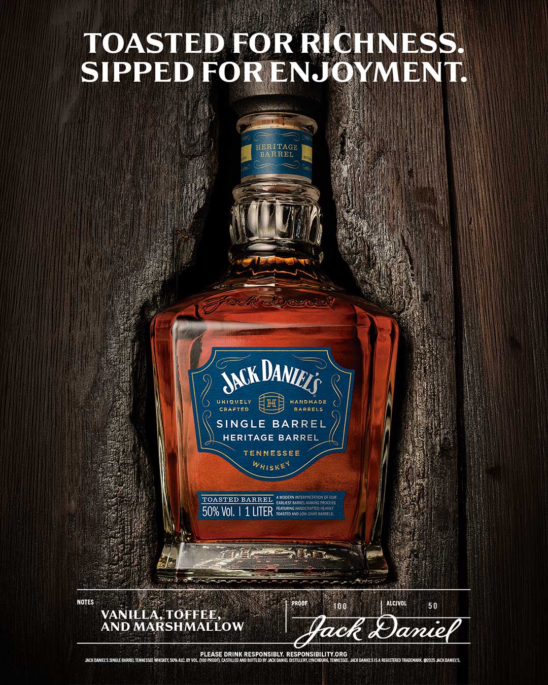 A bottle of Jack Daniel's Single Barrel Heritage on a wooden background.